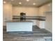 Modern kitchen with white cabinetry, granite countertops, and stainless steel appliances at 104 Salem Springs Ln, Statesville, NC 28625