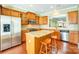 Spacious kitchen with granite countertops, wood cabinets, and stainless steel appliances at 2221 Hartwell Ln, Fort Mill, SC 29707