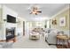 Bright living room with fireplace, hardwood floors, and open floor plan at 2221 Hartwell Ln, Fort Mill, SC 29707