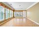 Sunroom features tiled floors and large windows with ample sunlight at 2221 Hartwell Ln, Fort Mill, SC 29707