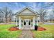 Inviting community gazebo with manicured landscaping and benches provides a shaded retreat for relaxation at 913 Deep River Way, Waxhaw, NC 28173