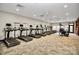 Well-equipped gym featuring treadmills, ellipticals, and other fitness equipment at 913 Deep River Way, Waxhaw, NC 28173