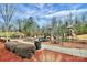 Community playground with climbing structures and slides offers outdoor Gathering entertainment at 913 Deep River Way, Waxhaw, NC 28173