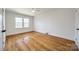 Bright bedroom with hardwood floors and double windows at 1081 Evergreen Cir, Rock Hill, SC 29732