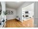 Light and airy entryway with hardwood floors, leading to the living room at 1081 Evergreen Cir, Rock Hill, SC 29732