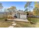 Spacious backyard with deck, shed, and seating area at 128 Hugh Caldwell Rd, Charlotte, NC 28214