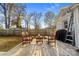 Wooden deck with seating area, perfect for outdoor relaxing at 128 Hugh Caldwell Rd, Charlotte, NC 28214