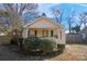 Cute bungalow with front porch and well-manicured landscaping at 128 Hugh Caldwell Rd, Charlotte, NC 28214