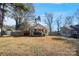 Exterior view of charming bungalow with well-maintained lawn at 128 Hugh Caldwell Rd, Charlotte, NC 28214