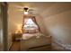 Cozy bedroom with bright natural light, window, and stylish furniture creating a relaxing retreat at 13538 Pine Harbor Rd, Charlotte, NC 28278