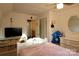 Bedroom with hardwood floors, closet, natural light and ceiling fan at 13538 Pine Harbor Rd, Charlotte, NC 28278