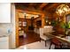 Charming dining room with hardwood floors and an open view to the living area at 13538 Pine Harbor Rd, Charlotte, NC 28278