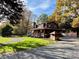 Charming two-story home with a covered porch and well-maintained lawn at 13538 Pine Harbor Rd, Charlotte, NC 28278