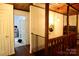 View of hallway, highlighting natural light, hardwood floors and modern lighting fixtures at 13538 Pine Harbor Rd, Charlotte, NC 28278