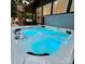 Relaxing hot tub with blue LED lighting, perfect for unwinding after a long day at 13538 Pine Harbor Rd, Charlotte, NC 28278