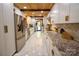 Modern kitchen with white cabinets, stainless steel appliances, and granite countertops at 13538 Pine Harbor Rd, Charlotte, NC 28278