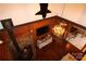 Aerial view of the cozy living room, showing fireplace and wood accents at 13538 Pine Harbor Rd, Charlotte, NC 28278