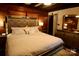 Luxurious main bedroom with a large bed, mirrored accents, and soft lighting at 13538 Pine Harbor Rd, Charlotte, NC 28278