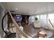 Spacious sunroom with hammocks, modern projector setup, and play area at 13538 Pine Harbor Rd, Charlotte, NC 28278