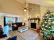 Living room with a stone fireplace and hardwood floors at 141 Byers Rd, Troutman, NC 28166