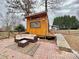 Brick patio with a sectional sofa and shed at 141 Byers Rd, Troutman, NC 28166