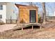 Playhouse in the backyard featuring a ramp and small porch at 141 Byers Rd, Troutman, NC 28166