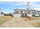 Exterior view of a two-story home with a two car garage, driveway, and lawn at 2117 Talbert Ct, Charlotte, NC 28214