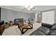 Cozy living room with neutral tones, offering a versatile space for relaxation and entertainment at 2117 Talbert Ct, Charlotte, NC 28214