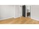 Hardwood floor bedroom with access to a full bathroom at 2205 Catalina Ave, Charlotte, NC 28206