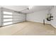 Attached garage with ample space and overhead storage at 2205 Catalina Ave, Charlotte, NC 28206