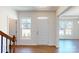 Inviting foyer with natural light, hardwood flooring, and a view of the home's exterior at 251 Winford Rd, Troutman, NC 28116