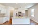 Modern kitchen with granite countertops, stainless steel appliances, and white cabinets at 251 Winford Rd, Troutman, NC 28116