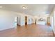 Spacious living room featuring open concept, hardwood floors and bright natural light at 251 Winford Rd, Troutman, NC 28116