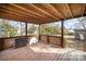 Covered deck overlooking the backyard at 317 W Main St, Marshville, NC 28103