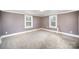 Bedroom with carpet, neutral walls, and window coverings at 317 W Main St, Marshville, NC 28103