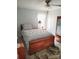 Comfortable bedroom showcasing a wooden bed frame and vintage decor at 335 Ridgewood Dr, Mt Ulla, NC 28125