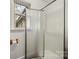 Bathroom featuring a shower stall and window at 352 Leafmore Dr, Charlotte, NC 28213