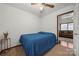 Bright bedroom featuring a double bed and access to another room at 352 Leafmore Dr, Charlotte, NC 28213