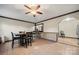 Dining area with a table and chairs, adjacent to kitchen and living room at 352 Leafmore Dr, Charlotte, NC 28213