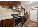 Stainless steel stove and granite countertops in the kitchen at 352 Leafmore Dr, Charlotte, NC 28213