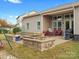 Large backyard patio with fire pit and seating area at 1419 Imperial Court Imperial Ct, York, SC 29745
