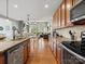 Open kitchen features an island, hardwood floors, and views into the living room at 1419 Imperial Court Imperial Ct, York, SC 29745