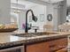 Modern kitchen sink with a high-arc faucet and granite countertop at 1419 Imperial Court Imperial Ct, York, SC 29745