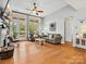 Spacious living room with fireplace, hardwood floors, and large windows at 1419 Imperial Court Imperial Ct, York, SC 29745