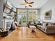 Spacious living room with fireplace, hardwood floors, and large windows at 1419 Imperial Court Imperial Ct, York, SC 29745