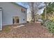 Cozy backyard with patio and mature trees at 14922 Deshler Ct, Charlotte, NC 28273