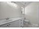 Neat bathroom with single vanity and tub at 14922 Deshler Ct, Charlotte, NC 28273