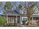 Brick townhouse with a landscaped front yard at 14922 Deshler Ct, Charlotte, NC 28273