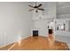 Living room with hardwood floors and a fireplace at 14922 Deshler Ct, Charlotte, NC 28273