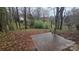 Spacious backyard with a brick patio area, ideal for outdoor entertaining and relaxation at 16425 Grapperhall Dr, Huntersville, NC 28078